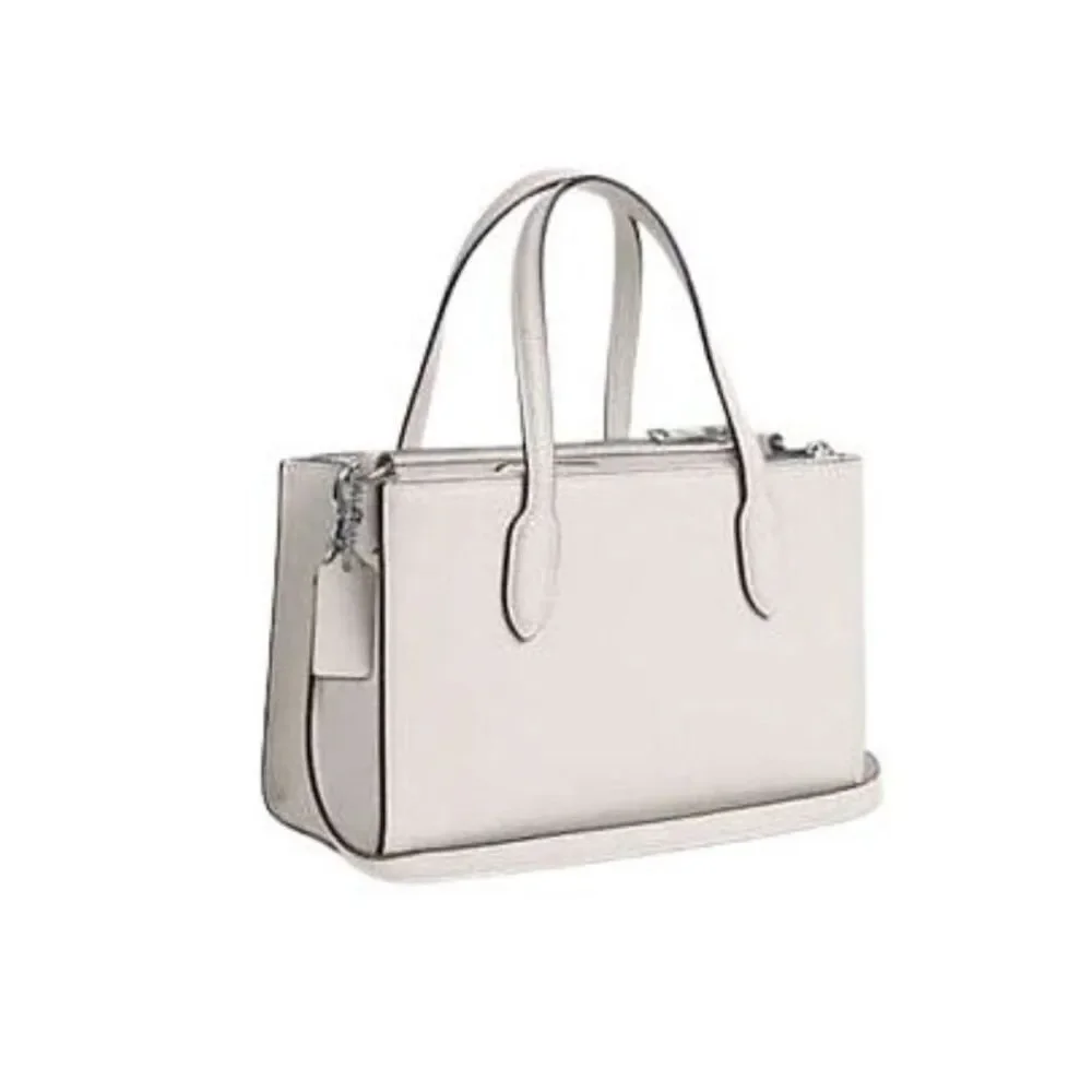 Coach handles leather